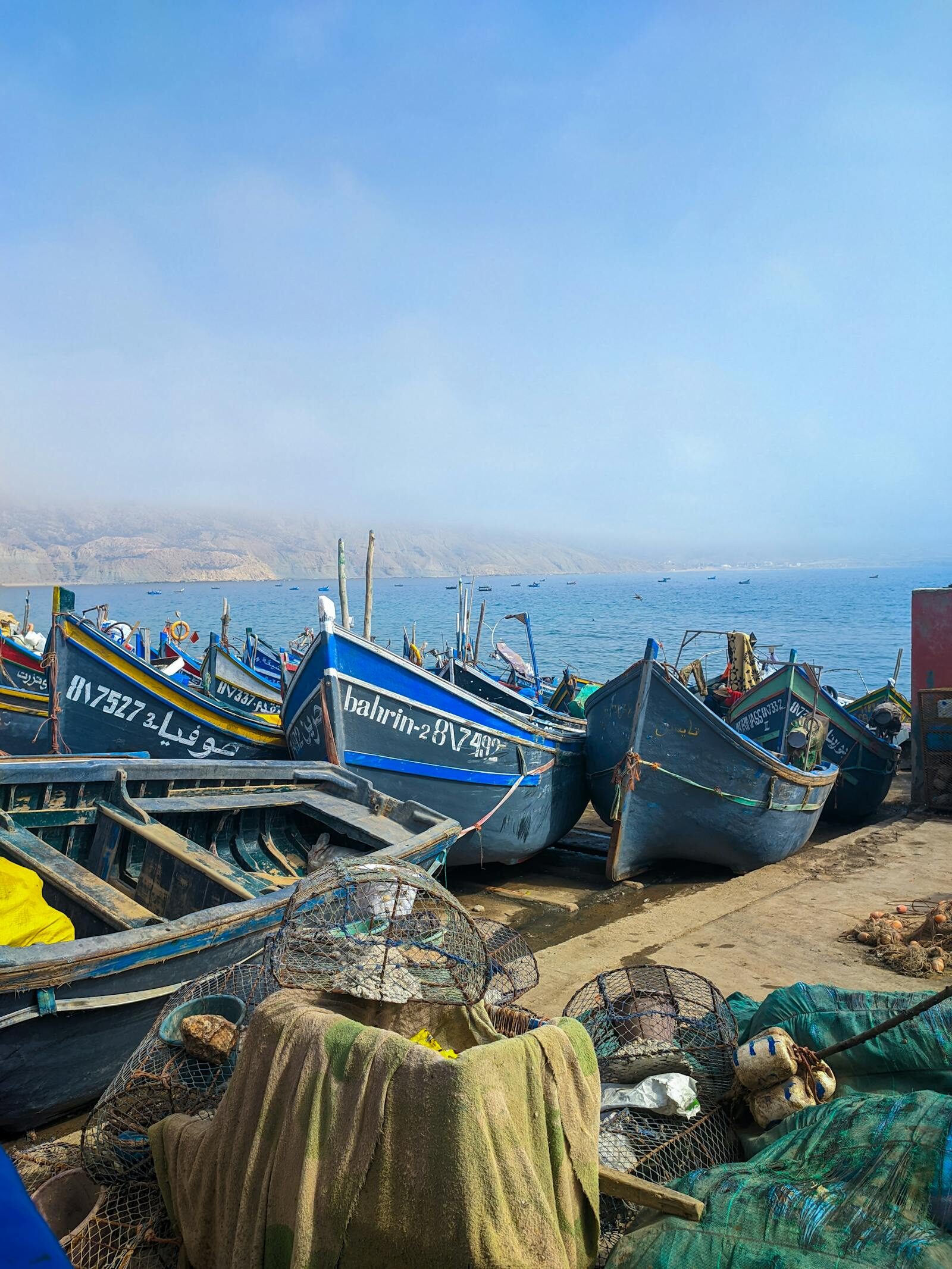 Traditional fishing boats in the harbour near Agadir Marina